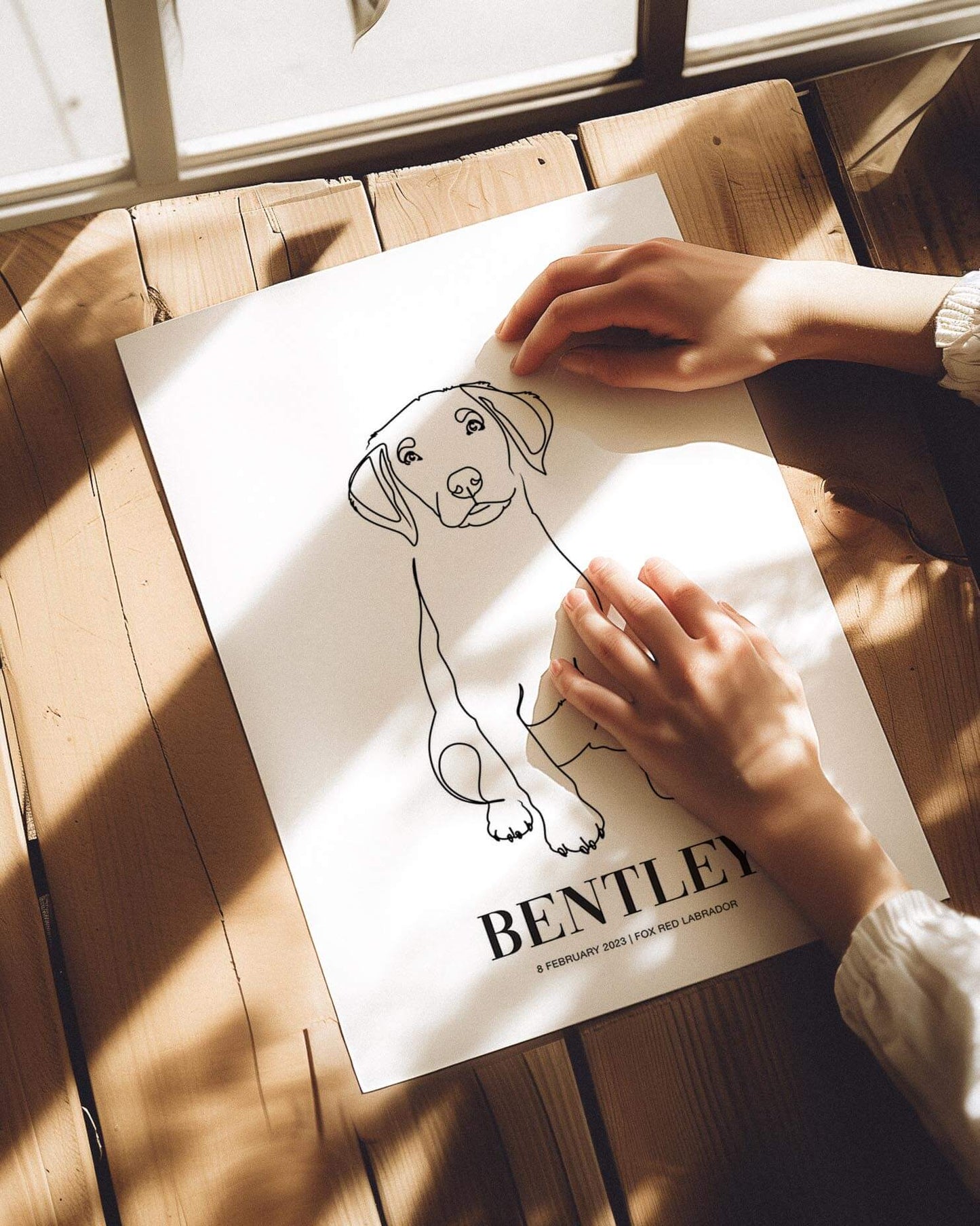 custom dog drawing line art in living room by vogue paws who specialize in personalized pet portraits for the home and gift ideas like pet memorial tribute art or dog mom and dog dad pet parent gift ideas.