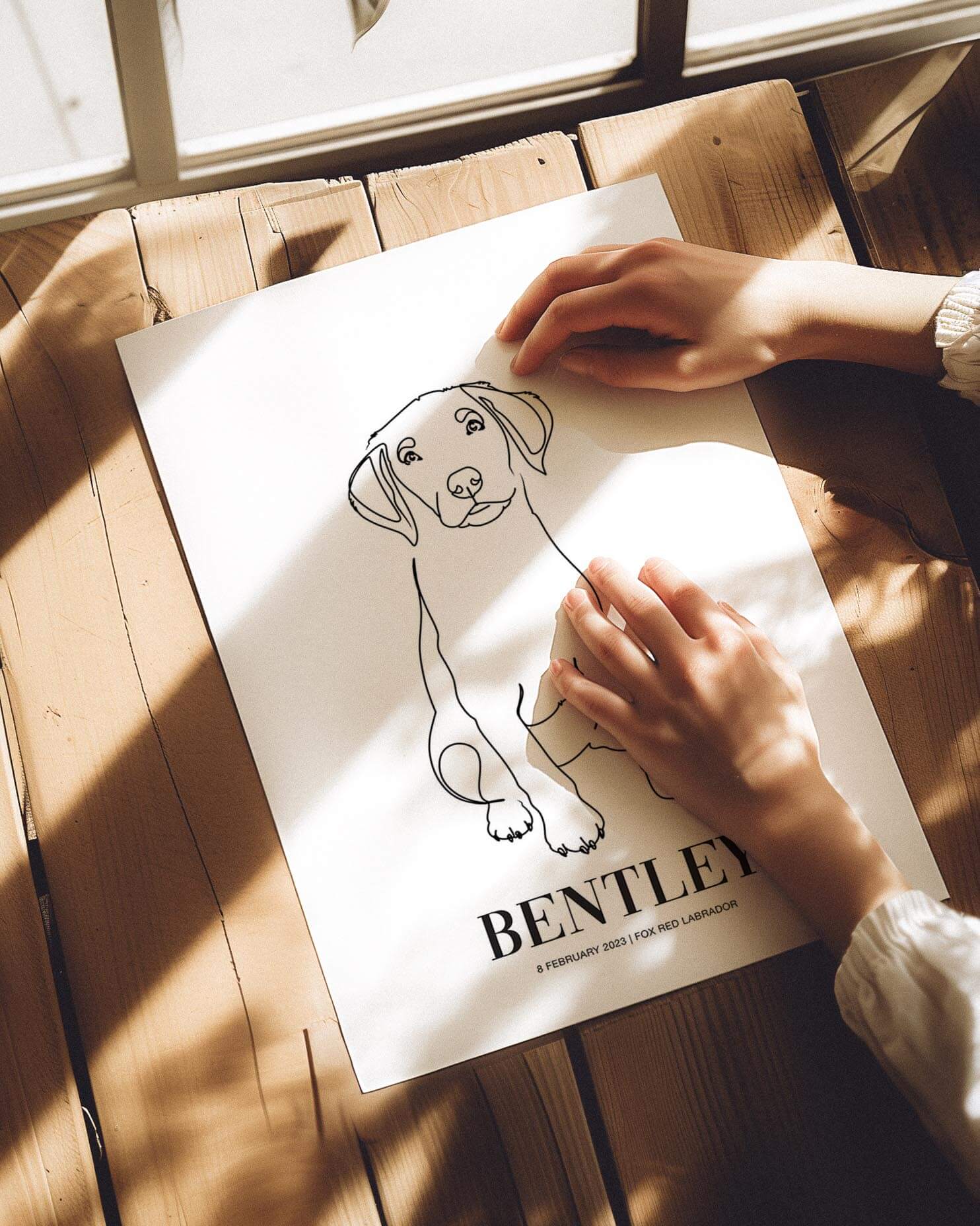 custom dog drawing line art in living room by vogue paws who specialize in personalized pet portraits for the home and gift ideas like pet memorial tribute art or dog mom and dog dad pet parent gift ideas.