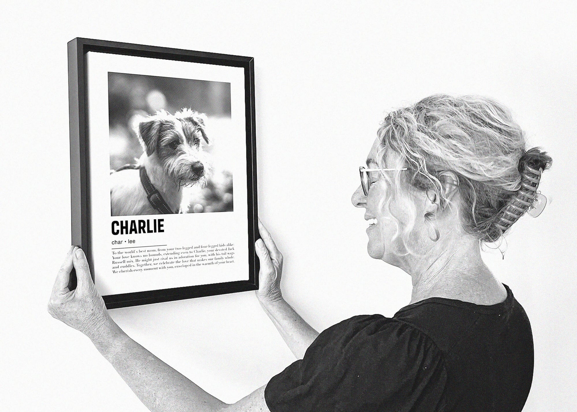 woman holding a personalized pet portrait dog mom gift idea, christmas gift ideas for dog moms.